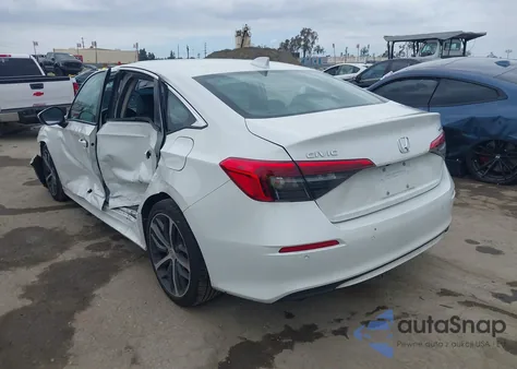 2024 Honda Civic Touring from USA, damaged, VIN 2HGFE1F9XRH330844